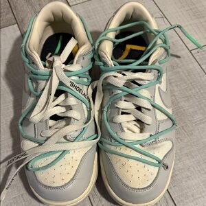 White and Gray Sneakers with Teal Laces